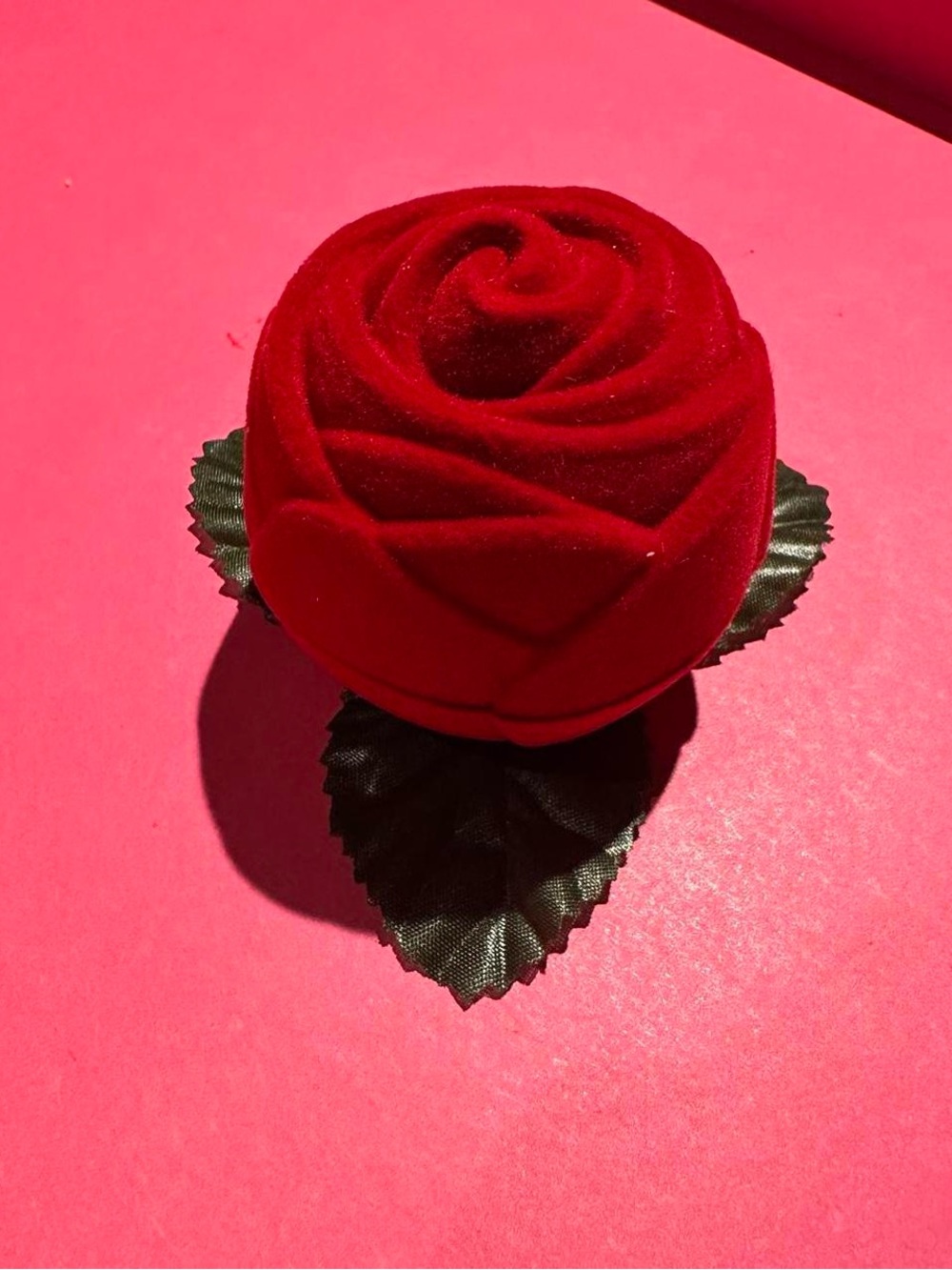 Velvet rose jewelry ring box.